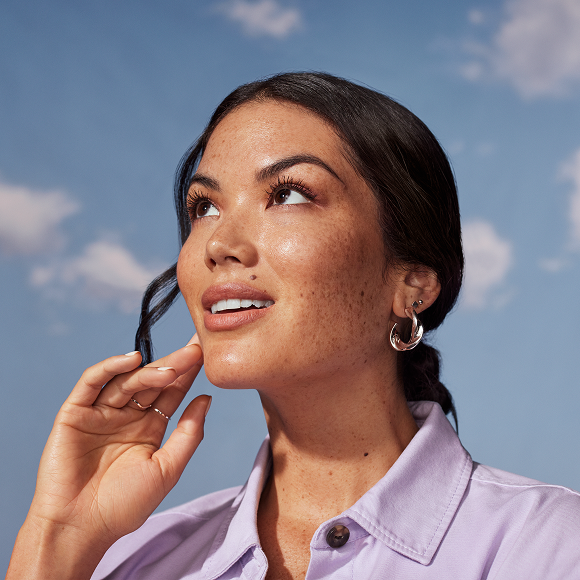 Smiling woamn wearing earrings