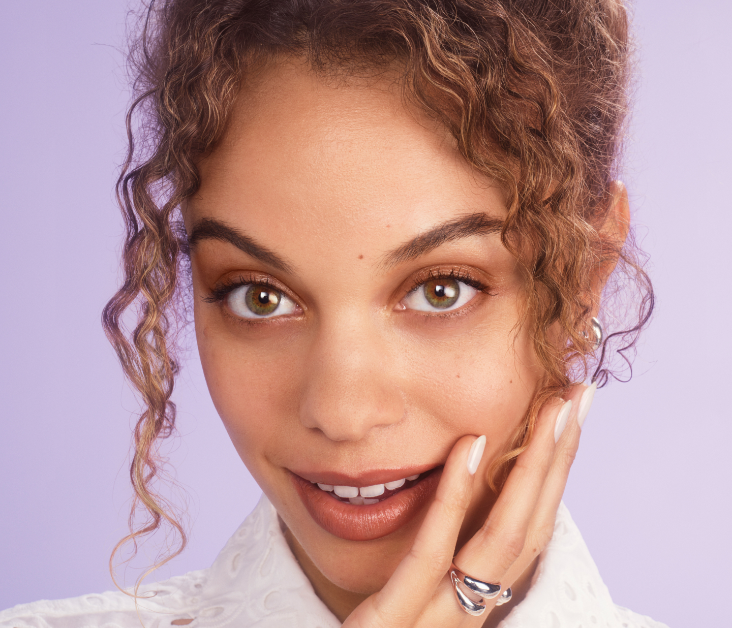 Close up of a woman's face highlighting her eyebrows
